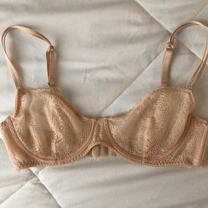 Feminine lace demi cup bra see through